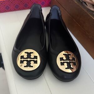 Tory Burch Black Flats with Gold Emblem